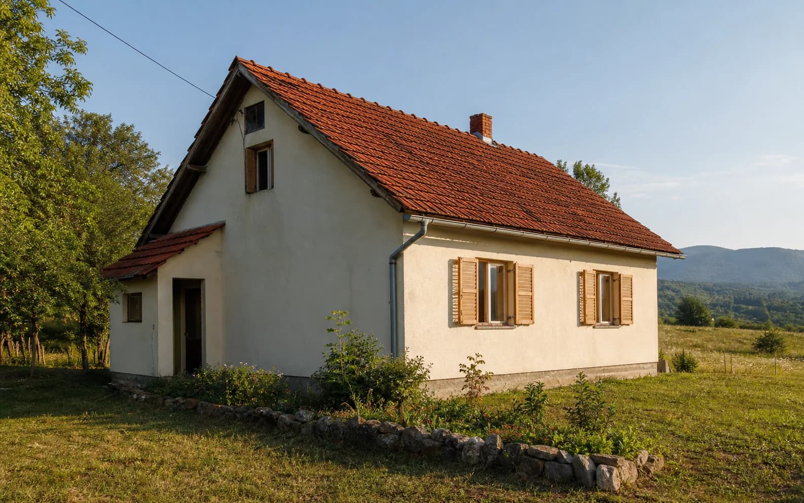 Illustratives Foto für Velika Popina, Gračac: Wohnaußenansicht in offener Landschaft.