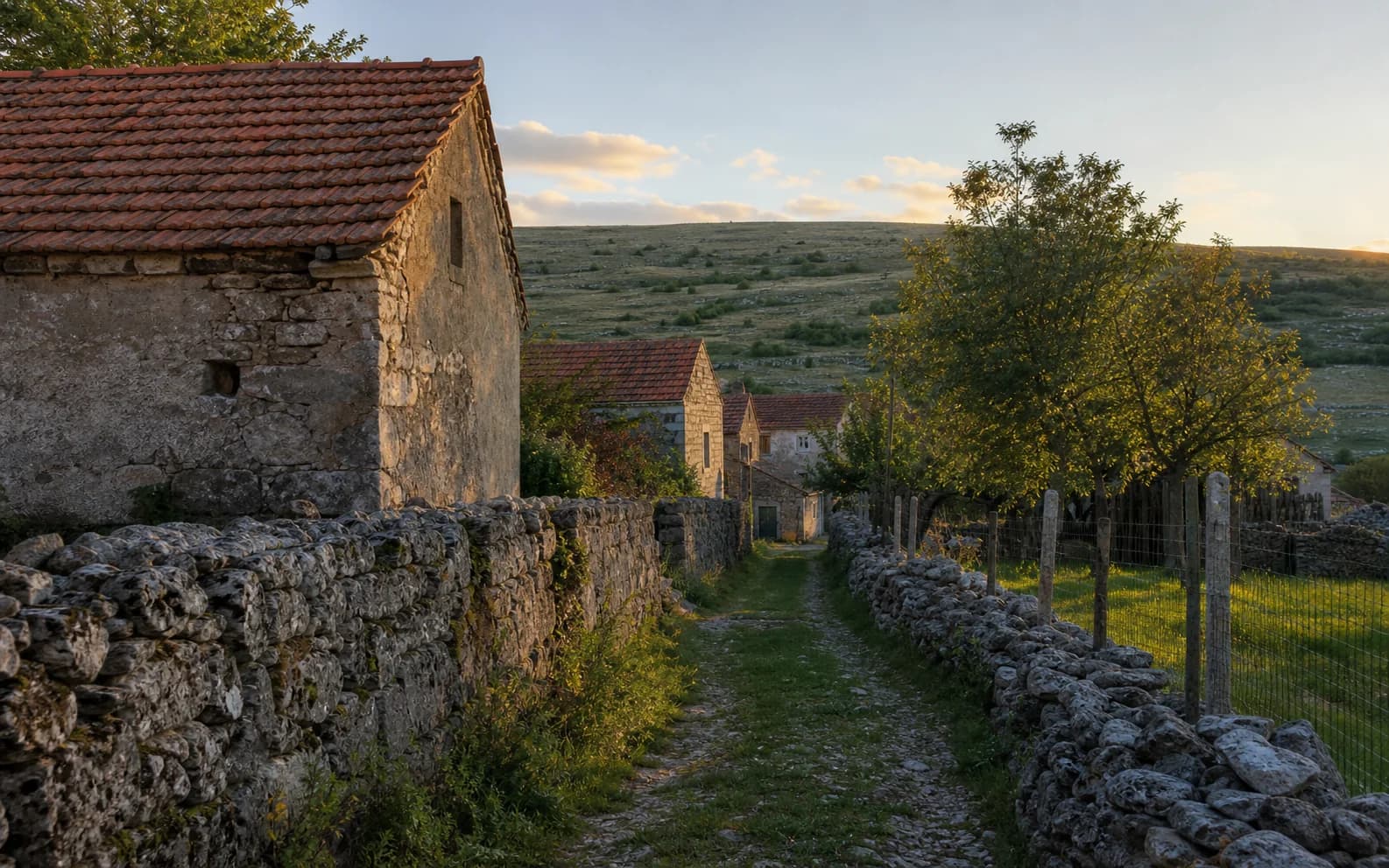 Illustrative photo for Kaldrma, Gračac: a quiet settlement street in a hilly setting.