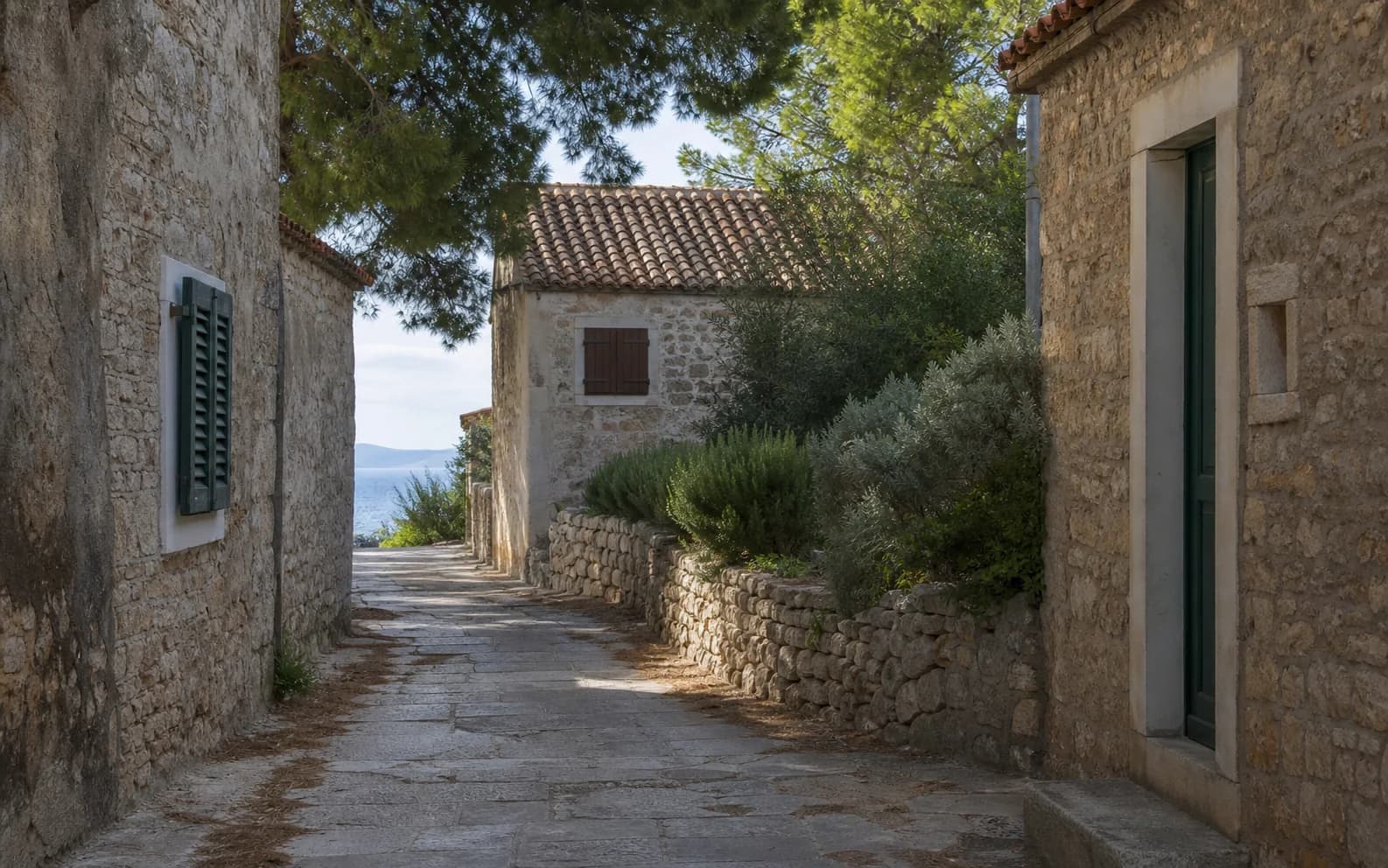 Illustrative photo for Zapuntel, Zadar: a quiet street among stone homes.